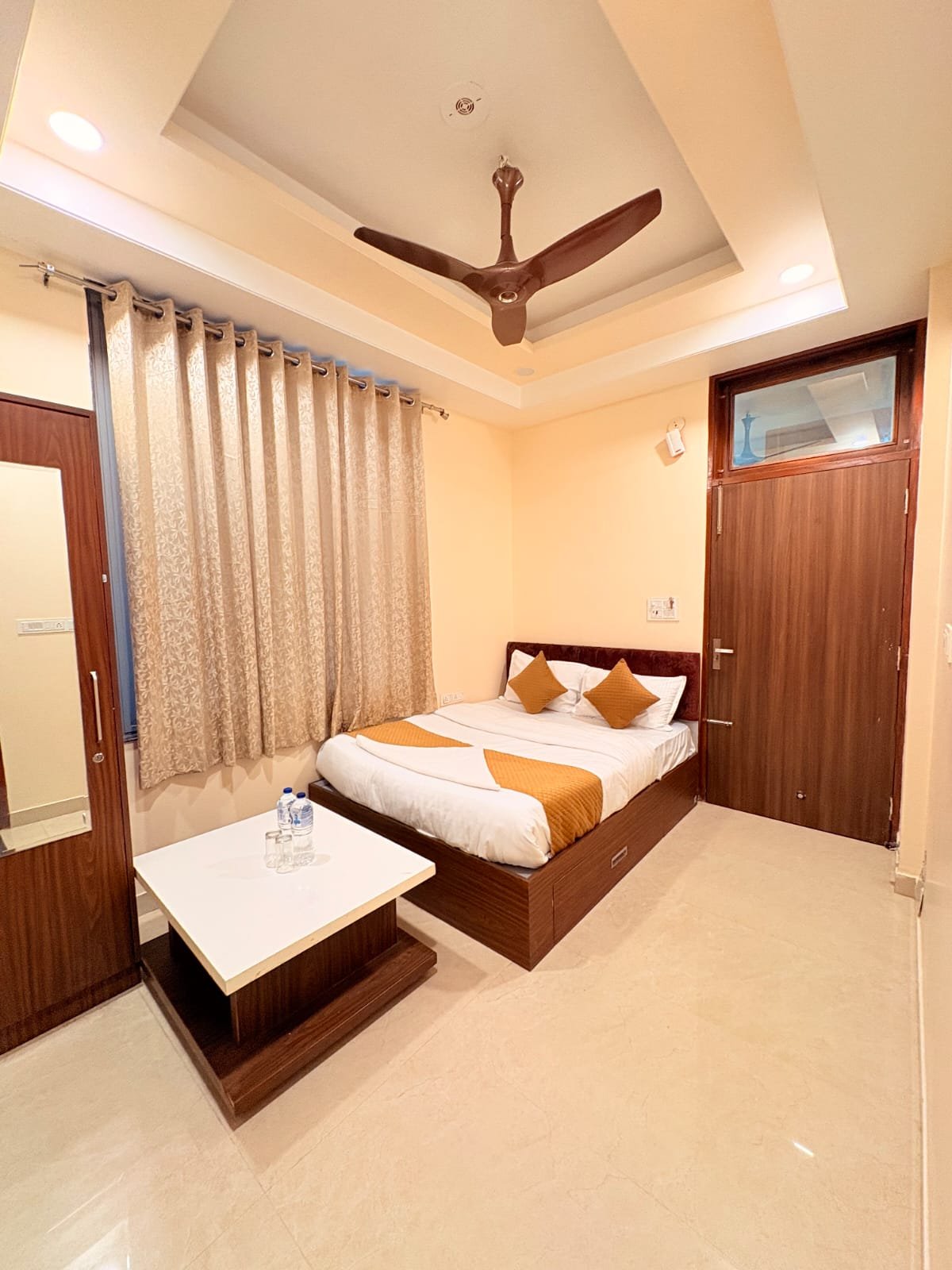 Deluxe room with mustard accents